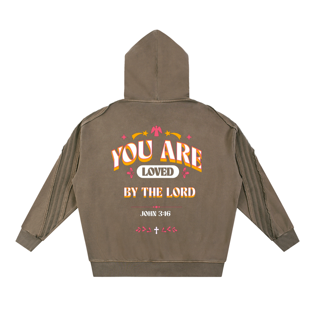 Snow Washed Tape raw edge zip hoodie with You Are Loved by the Lord graphic on back in brown color