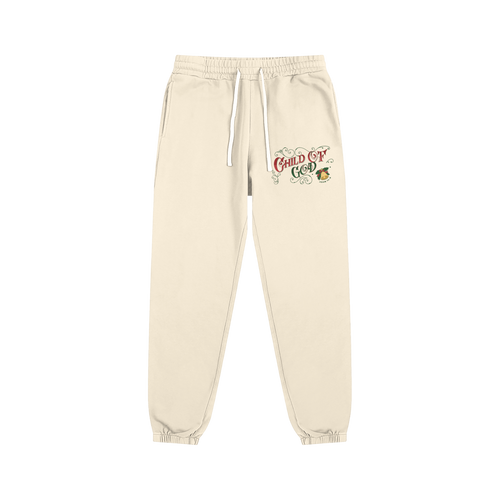 Beige Essential Sweatpants with Child of God Christmas logo and drawstring waistband