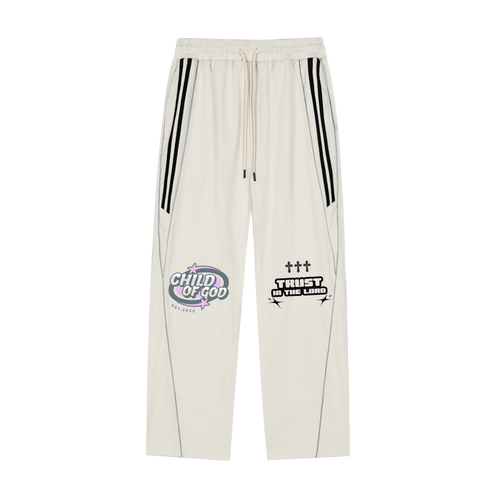 White track pants with black stripes featuring "Child of God" and "Trust in the Lord" printed designs